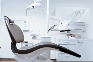 empty dental chair in a white office