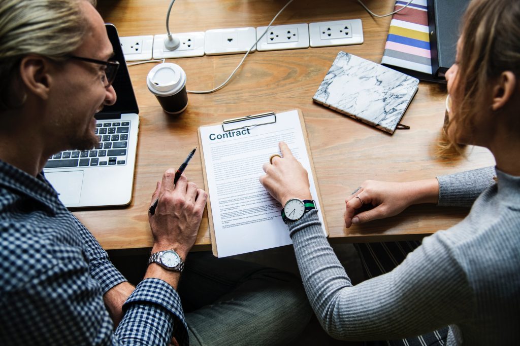 Employer Discussing Open Enrollment with Employee